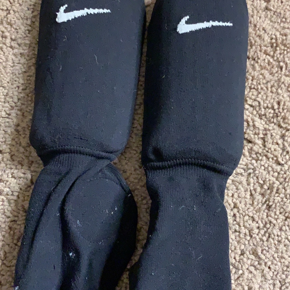 Sock shin guards by Nike